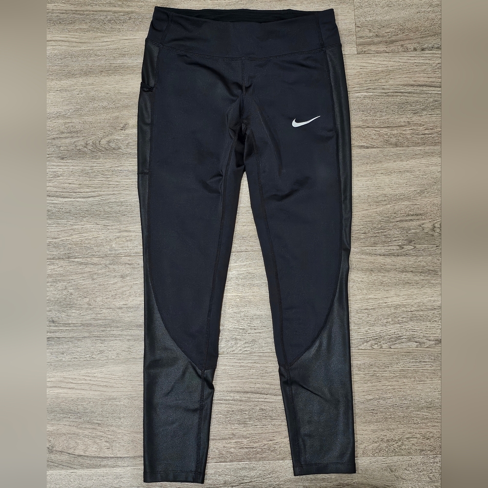 Nike black leggings with side pocket and reflective logo, size small, 25"